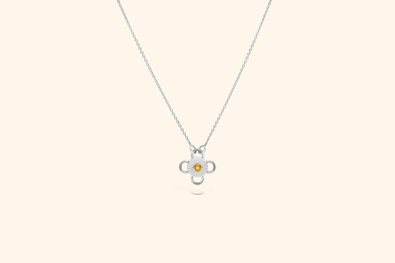 Baby Bolt Necklacea ~0.2 carat yellow sapphire set in silver. 