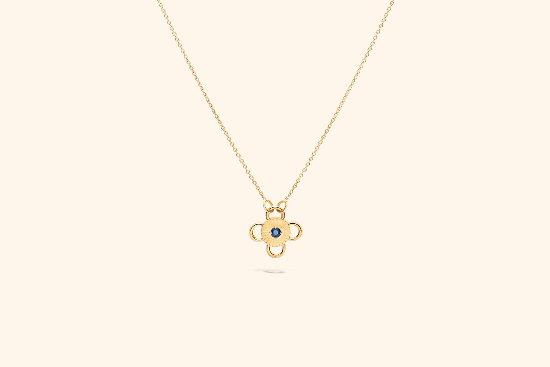 Baby Bolt Necklacea ~0.04 carat sapphire set in recycled 18k yellow gold.