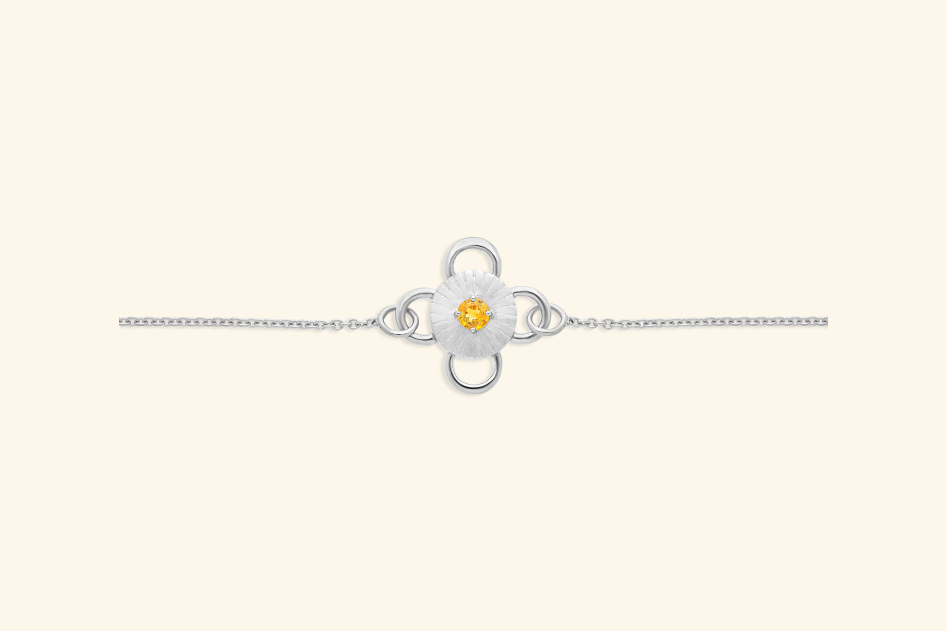 Baby Bolt bracelet jewelry in silver, set with a round yellow sapphire